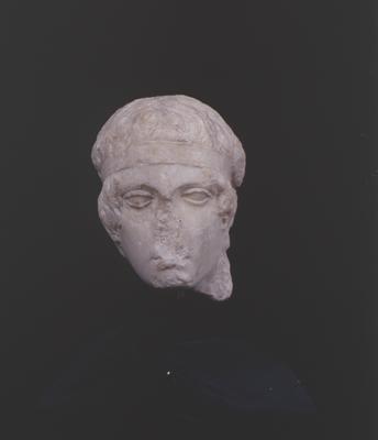 Testa di Diadoumenos (testo di efebo con benda) Provenienza ignota. Marmo greco a grana fine, età claudia h. 21 cm. Roma, Museo Nazionale Romano